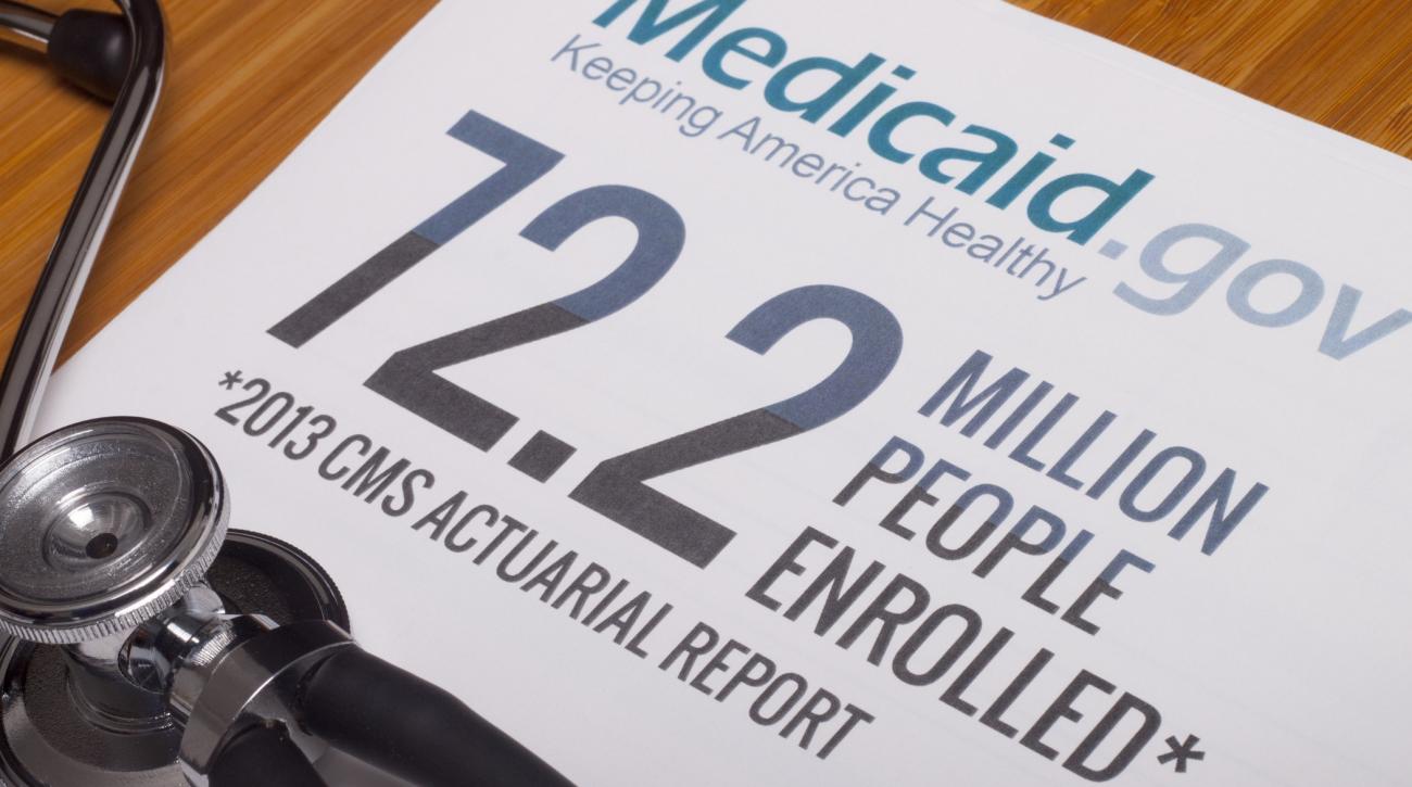 Report cover with Medicaid.gov logo stating 72.2 million people enrolled