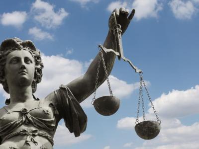 Statue of Justice holding scales