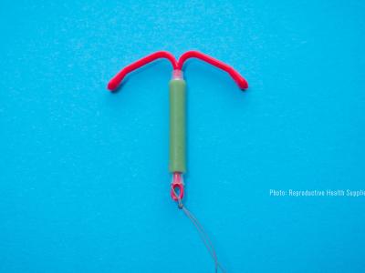 IUD on blue background. Photo credit: Reproductive Health Supplies Coalition